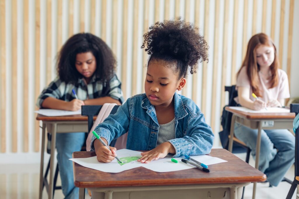 Girl is study in the Classroom. Back to school!