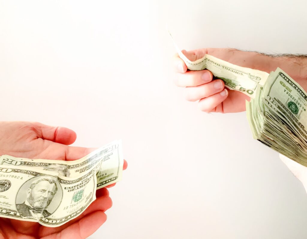 Paying money hands only white background